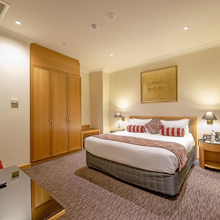 Duxton Hotel Перт Екстер'єр фото A bedroom at the hotel